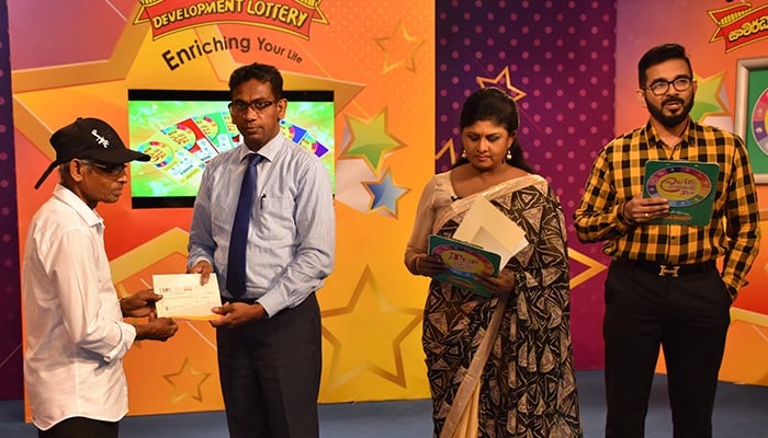 The cheque is awarded to super winner of Kotipathi Kapruka lottery